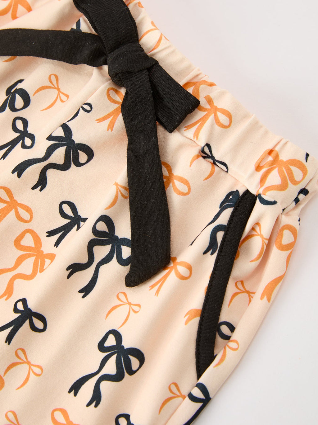 Girls Halloween Pajama Set – Bow Print Long Sleeve Top & Ruffle Shorts